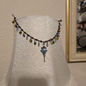 Elegant Beaded Necklace with Blue and Green Accents